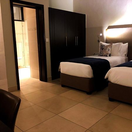 Mythos Boutique Hotel Kigali Quarto foto
